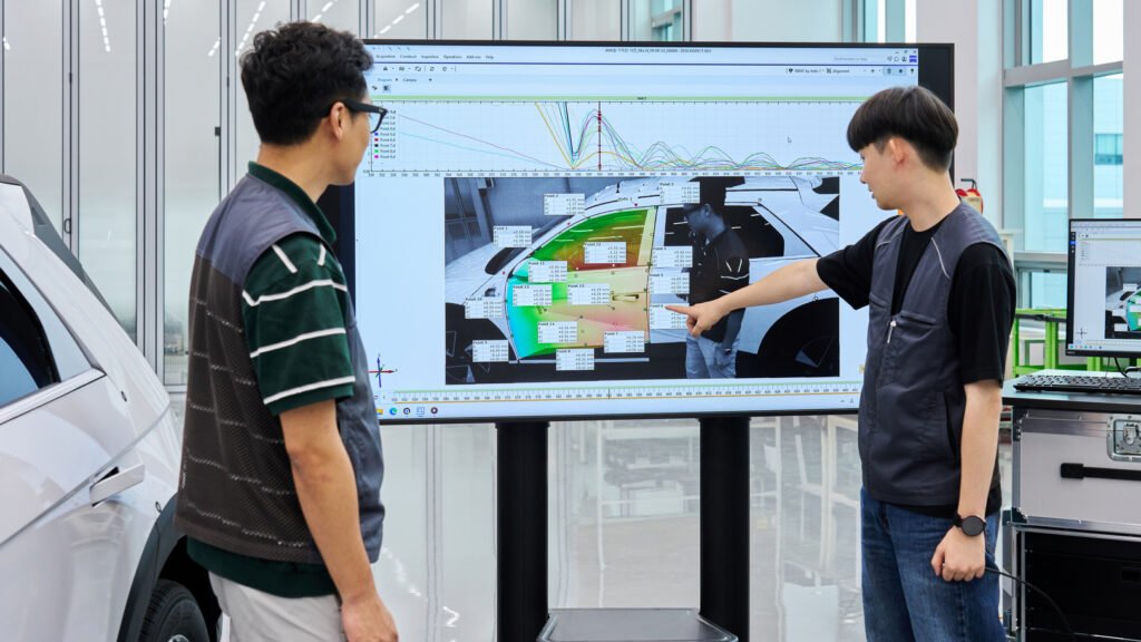 Engineers review dynamic motion validation results
